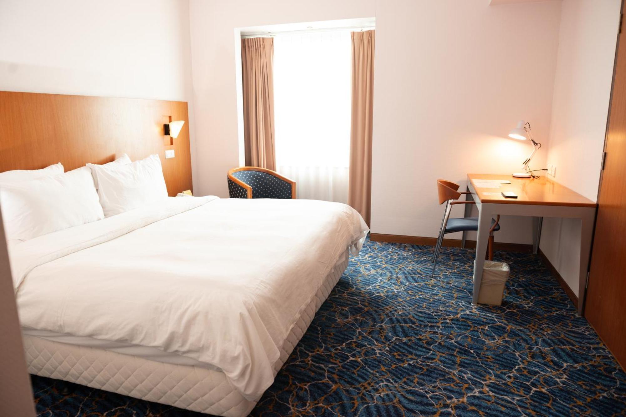 Parkcity Everly Hotel Бинтулу Экстерьер фото